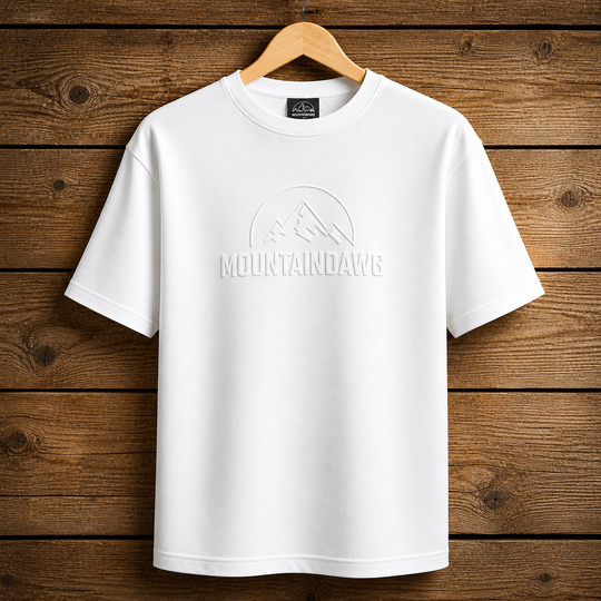 Mountain Dawg Iconic Embossed Tee in Classic White — hero shot oversized fit | Mountain Dawg